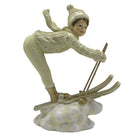 Beeld skiënd kind 19 cm beige goudkleurig kunststof