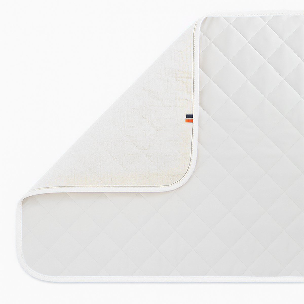 Nomadic changing mat Lubiana in white organic cotton