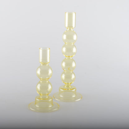 Kandelaars glas geel set van 2