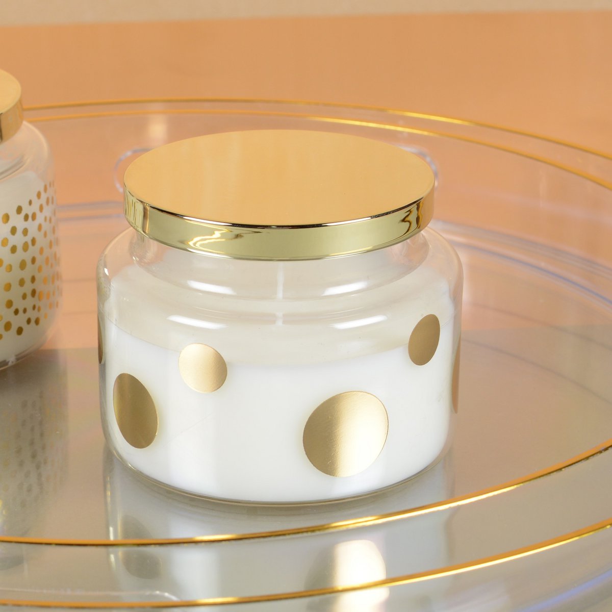 Ronde kaars met stippen en gouden salie parfumdeksel