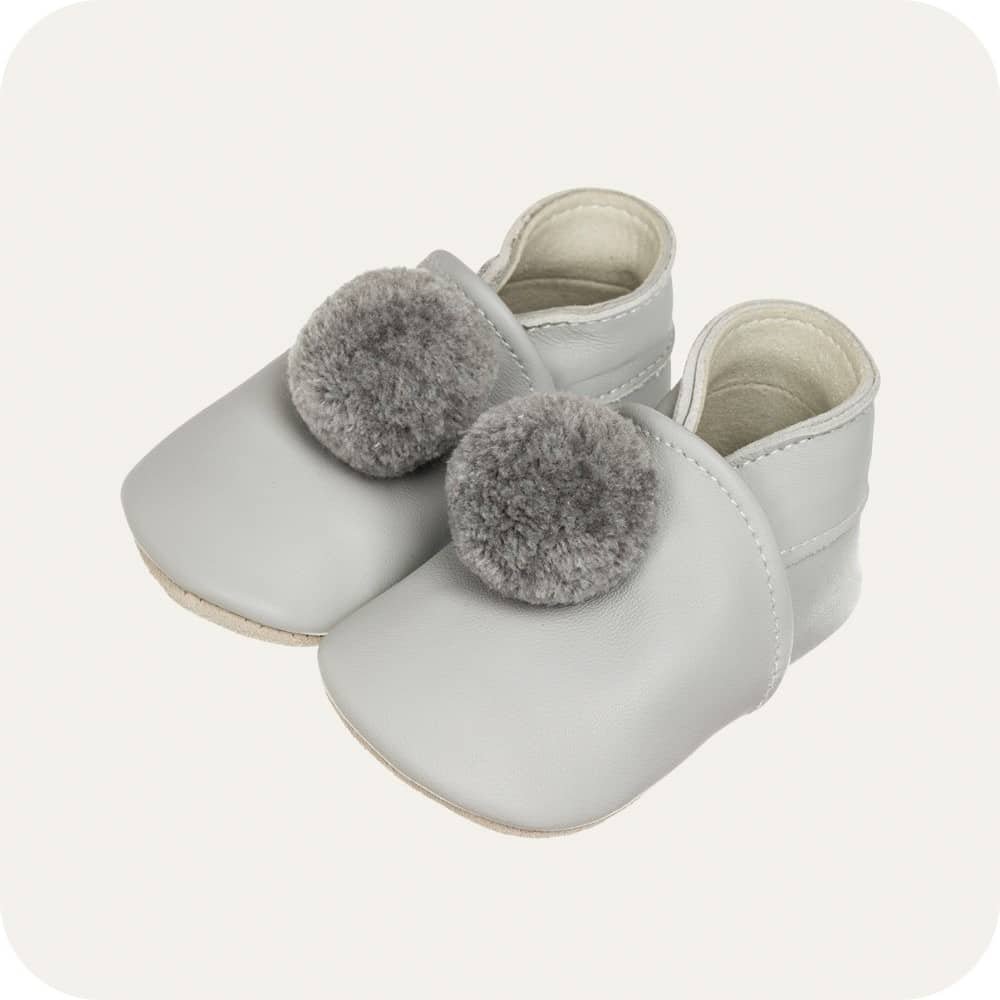 Baby booties with pompoms Grey